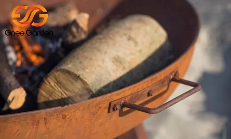 Corten Steel fire pit in backyard Corten Steel fire pit in backyard